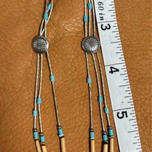 Western silver concho necklace.